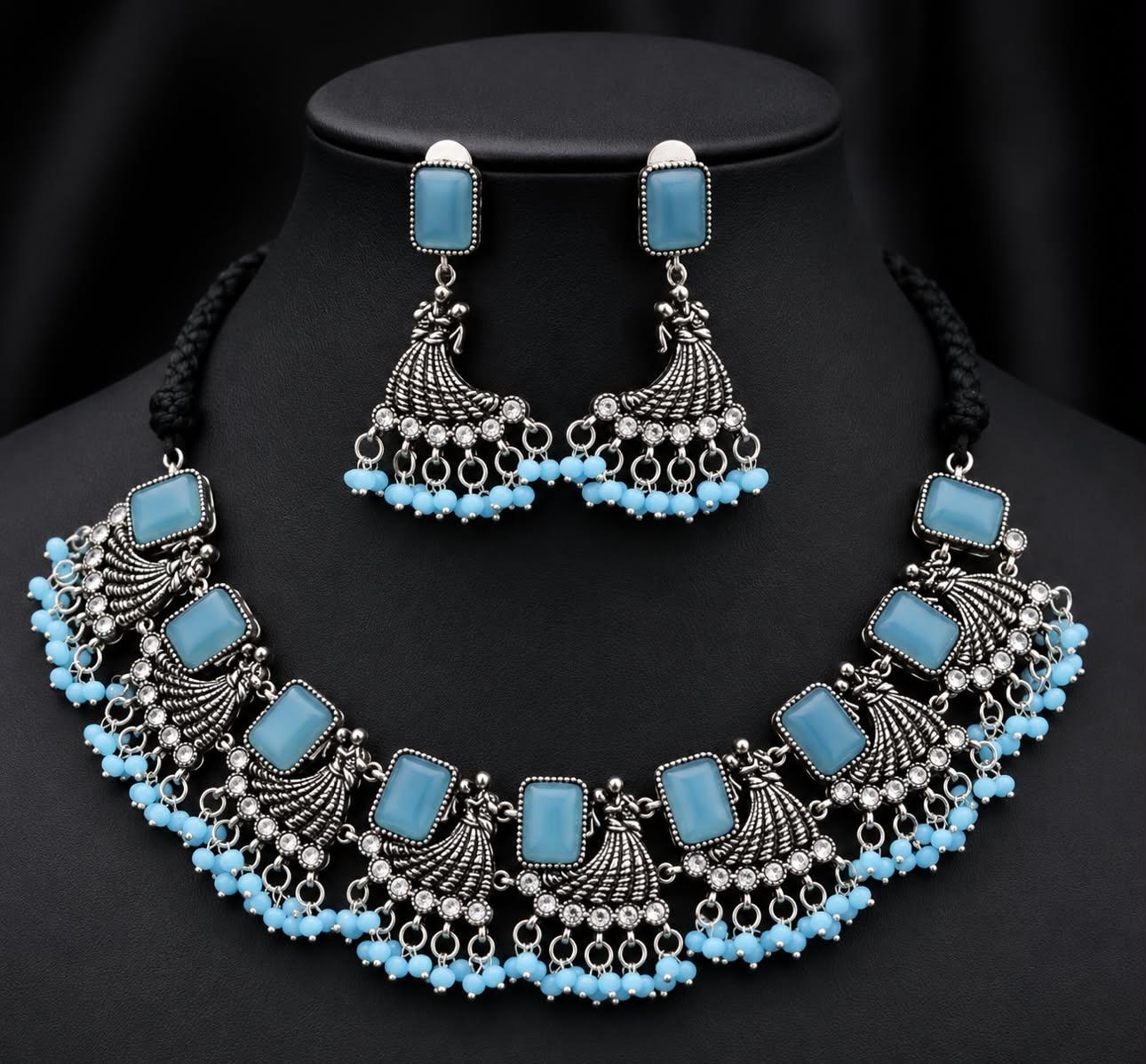 Name : - Necklace Best Designing with for woman  Base Metal : Brass  Plating : Oxidised Silver  Stone Type : Cubic Zirconia/American Diamond  Sizing : Adjustable  Type : Necklace and Earrings  Net Quantity (N) : 1  Brand : Eivri Color: PINK Material: Brass Jewellery Care: Wipe your jewellery with a soft cloth after every use. Always store your jewellery in jewellery box to avoid accidental damage. Keep water, sprays and perfumes away from jewellery. Disclaimer: Product color may slightly vary due to photographic lighting sources or your monitor settings.  Country of Origin : India